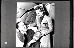 Recognize him? It's Bob Feller, famous baseball pitcher, now with the Navy. Bob is shown receiving a plaque certifying him as a member of Un