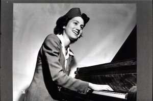 In 1938 this young lady, Miss Betty Clemens, was driven from her Paris music conservatory by the threat of Nazi invasion and decided to beco