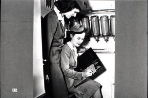 At last the great day for Dorothy's first flight as a student-stewardess arrived and she was given "on the spot" instruction during an actua
