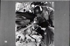 And here's a picture which illustrates how that blood which you give to the Red Cross is used aloft as on the ground.