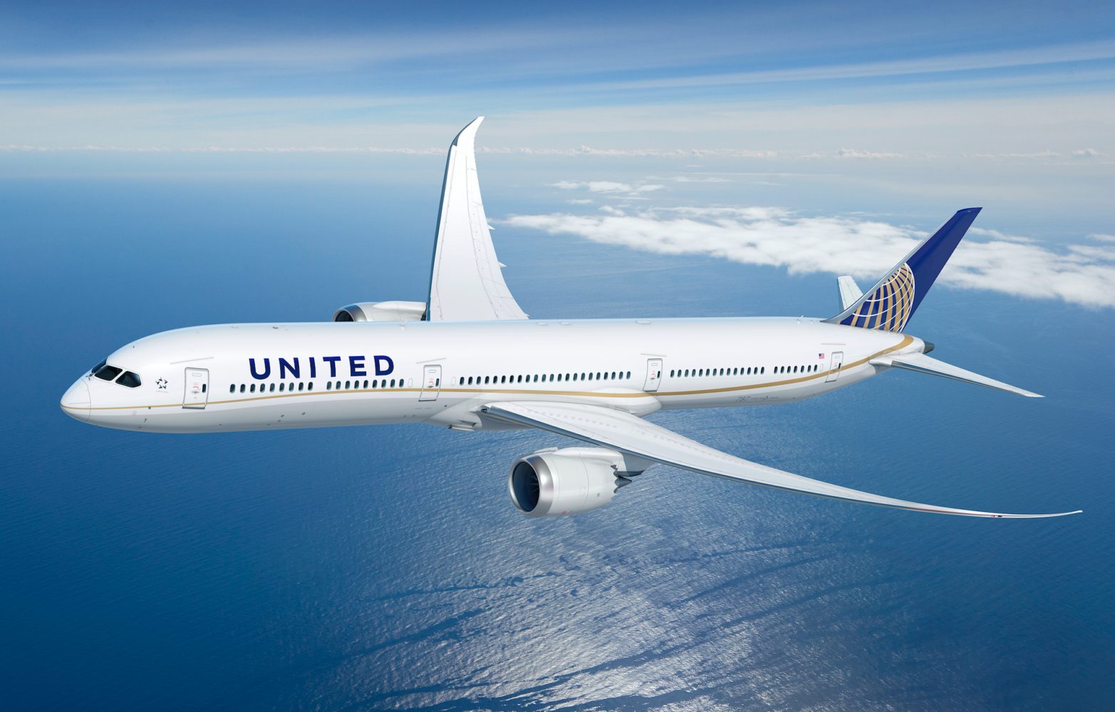 A United Airlines Boeing 787-9 Dreamliner in flight over the ocean