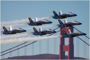 Left - The popular and inspiring Navy Blue Angels are being readied for takeoff to go to the downtown San Francisco area for an air show. Ri
