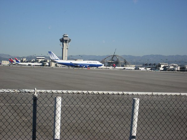 Visitors to Flight Path can see views of aircraft taking off and landing. A majestic United B747 is taxing in the background.