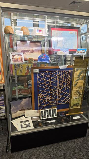 Pacific-themed collection with maps and artwork